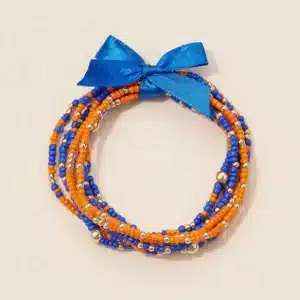 Seed Bead Bracelet Set l Thunder Blue and Orange with gold accent beads with a small fabric bright blue bow
